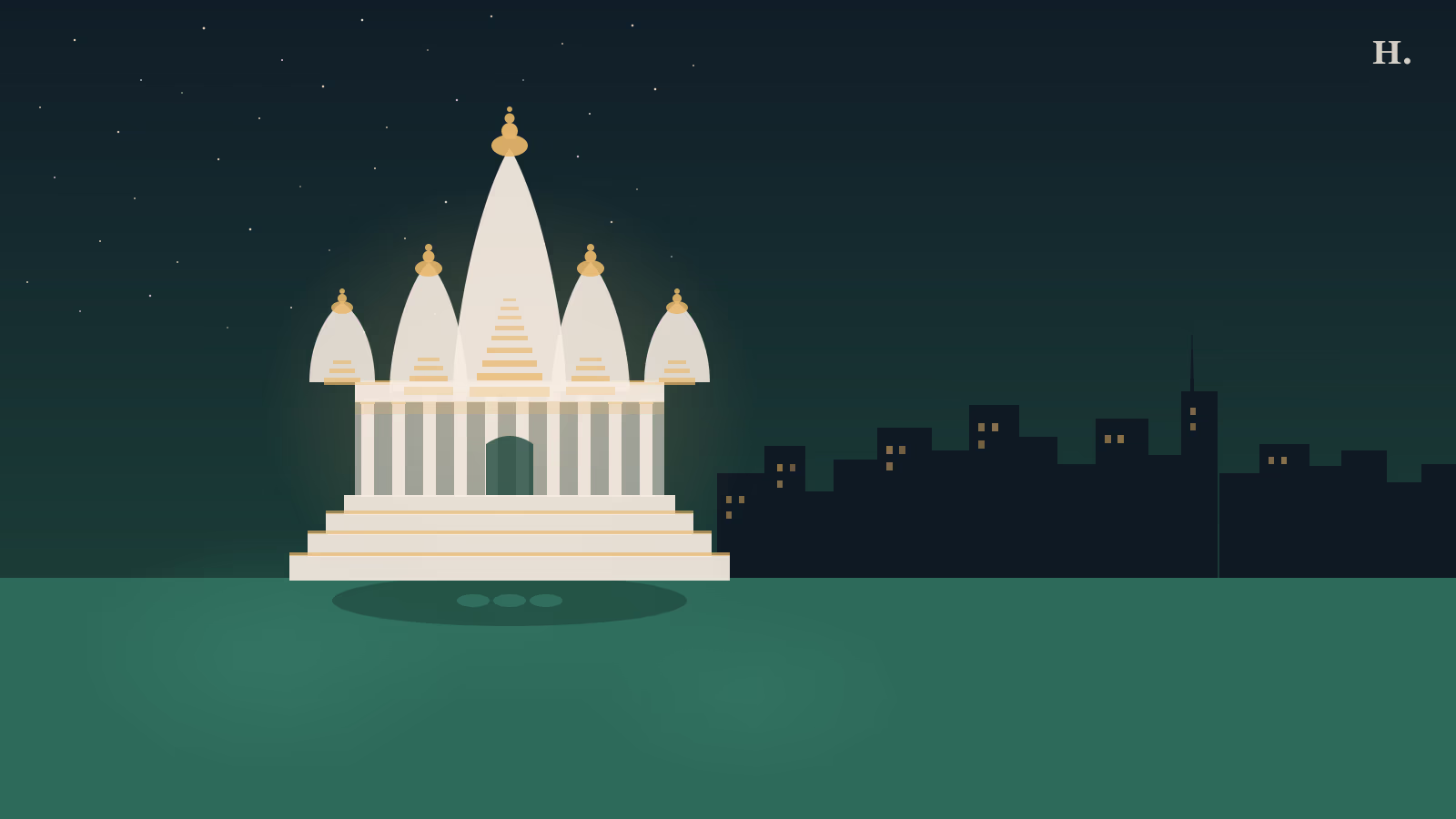 BAPS mandir Houston white marble temple with five golden spires against night sky