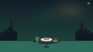Best brunch Rice Village Houston: wine glass, avocado toast and coffee on a bistro table under a night sky