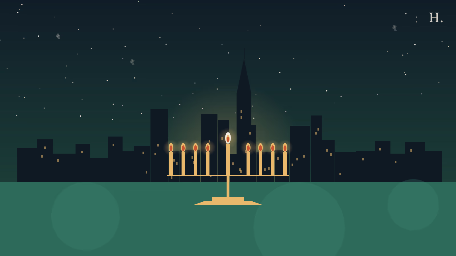 Hanukkah in Houston: lit menorah in the foreground against the downtown Houston night skyline